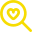 Yellow magnifying glass with heart for property searches and finding homes with Chelton Brown in Northamptonshire.