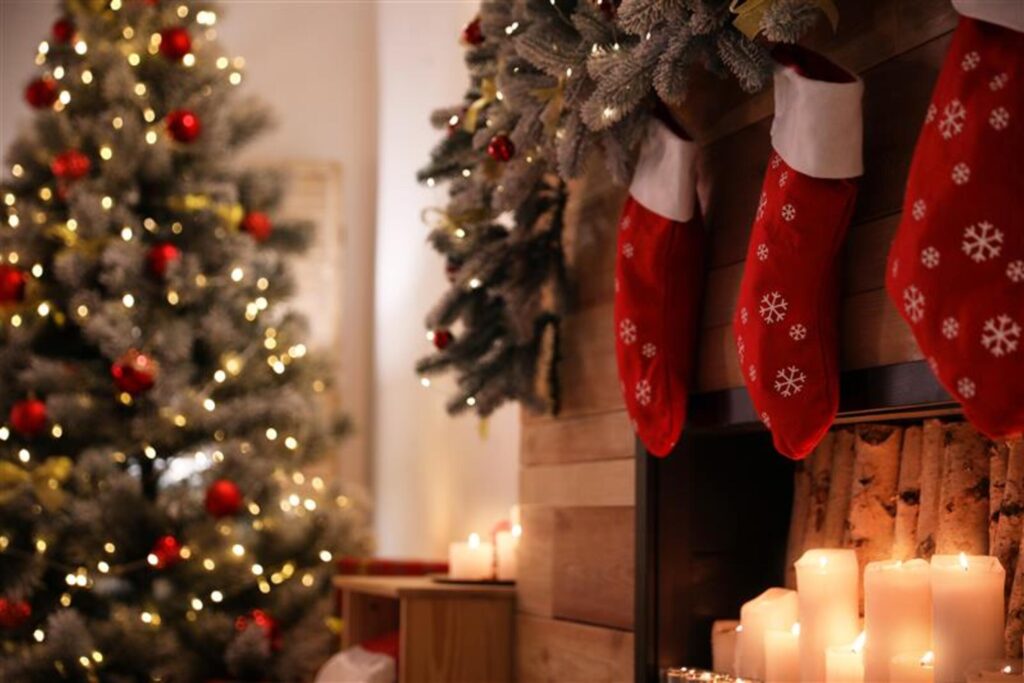 Staged Christmas living room with festive tree and stockings for property sales in Northamptonshire with Chelton Brown.