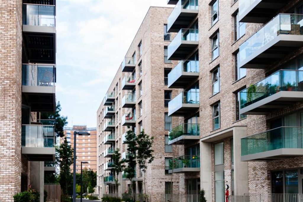 Modern brick apartments with balconies, illustrating Renters' Rights Act changes for landlords at Chelton Brown.